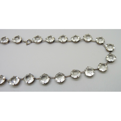 7133 - A silver riviera necklace set with white paste stones, 29g, 42cm