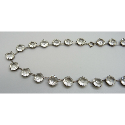 7133 - A silver riviera necklace set with white paste stones, 29g, 42cm