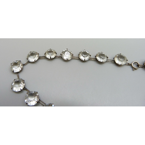 7133 - A silver riviera necklace set with white paste stones, 29g, 42cm