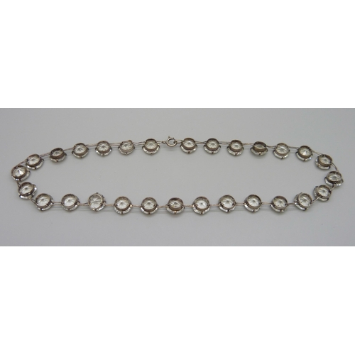 7133 - A silver riviera necklace set with white paste stones, 29g, 42cm