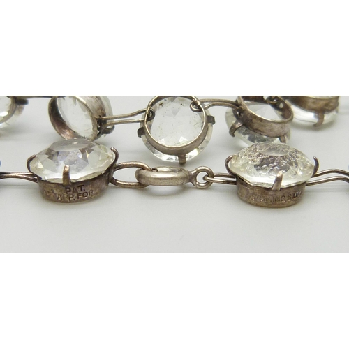 7133 - A silver riviera necklace set with white paste stones, 29g, 42cm