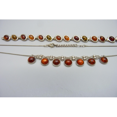 7139 - A white metal and amber bracelet, and a silver and amber necklace, 24g