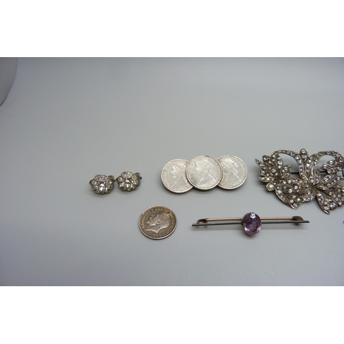 7143 - A collection of silver and white metal jewellery including a paste set brooch, earrings, bar brooch,... 