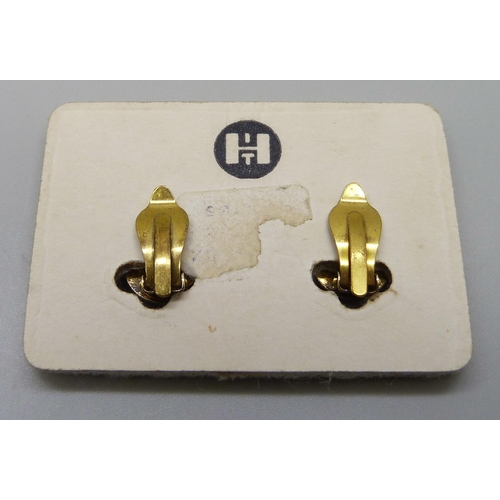 7144 - A pair of Norwegian silver gilt and enamelled clip-on earrings by Ivar T. Holth