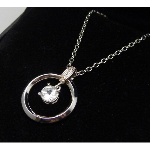 7147 - A Clogau Welsh silver pendant on a chain set with spinel stones, 2.4cm pendant