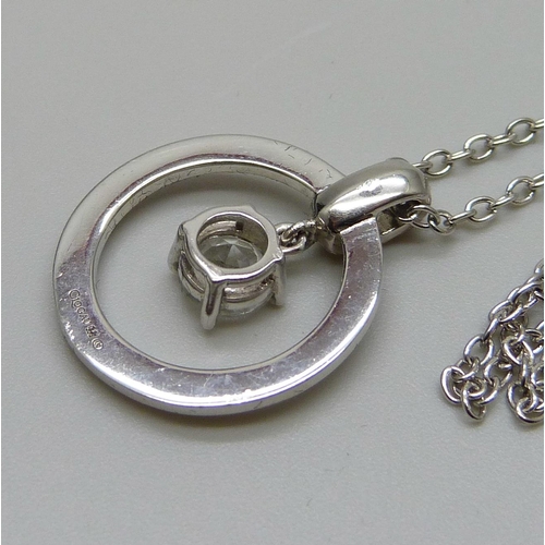 7147 - A Clogau Welsh silver pendant on a chain set with spinel stones, 2.4cm pendant