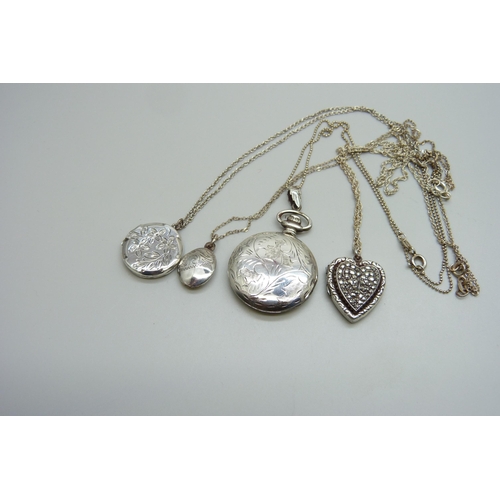 7150 - Four silver lockets and chains, 28g