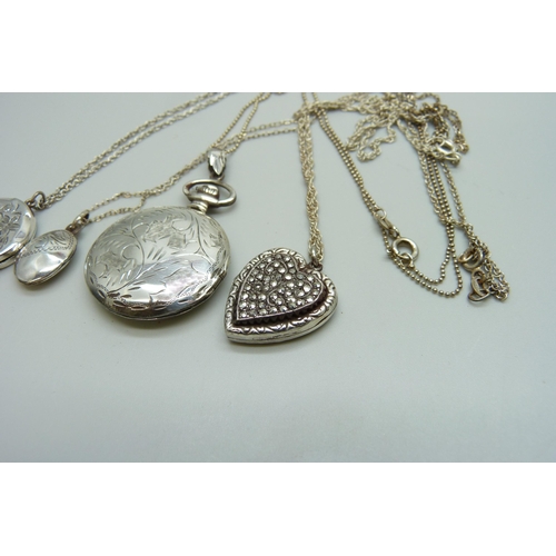 7150 - Four silver lockets and chains, 28g