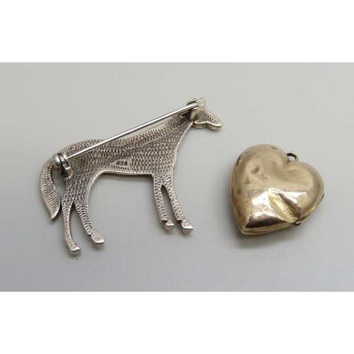 7152 - A yellow metal locket set with a diamond, 2.1g, a/f, and a silver horse brooch, 10g, 4.2cm