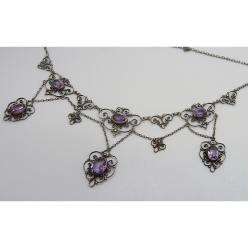 7154 - A .800 Continental silver drop necklace set with amethysts,