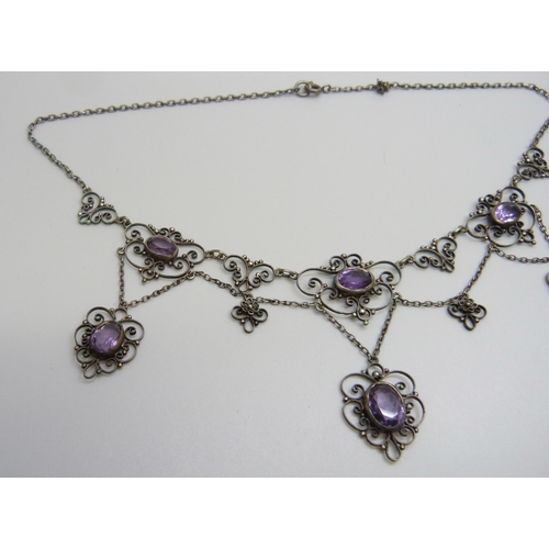 7154 - A .800 Continental silver drop necklace set with amethysts,