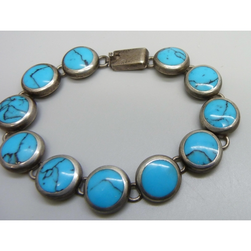 7159 - A Mexican silver panel bracelet set with turquoise, 28g, 20.5cm