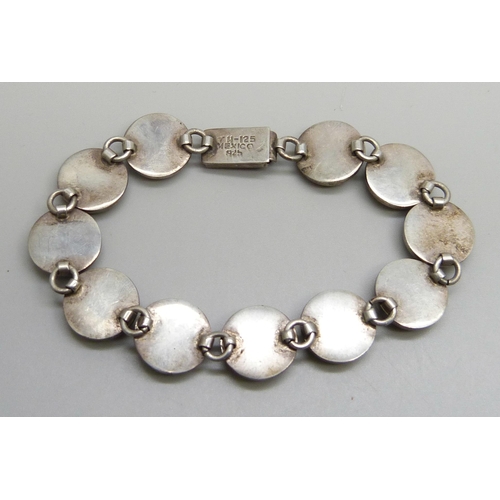 7159 - A Mexican silver panel bracelet set with turquoise, 28g, 20.5cm