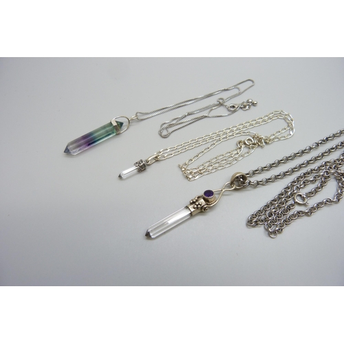 7165 - Three crystal pendants set in silver on silver chains, 30g