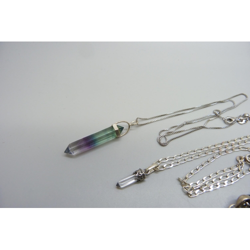 7165 - Three crystal pendants set in silver on silver chains, 30g