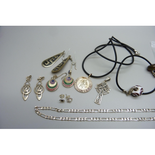 7172 - A collection of silver and white metal jewellery including earrings, a St Christopher, chain, etc.