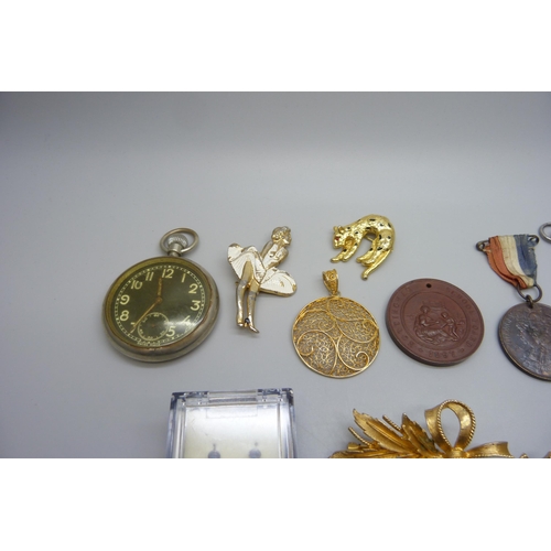 7174 - A collection of items including a pocket watch with black dial, a paste set buckle, brooches, a silv... 