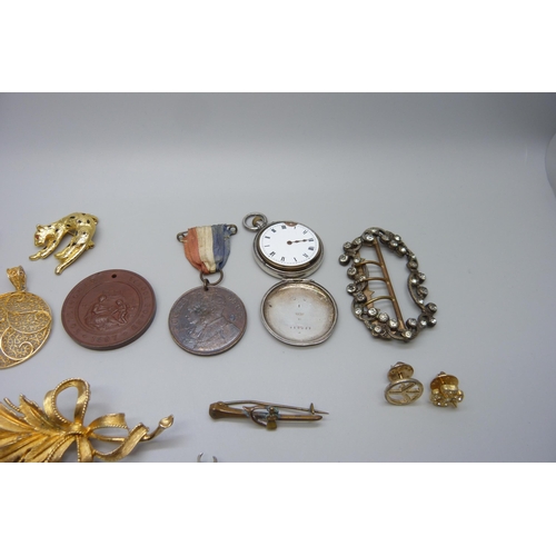 7174 - A collection of items including a pocket watch with black dial, a paste set buckle, brooches, a silv... 