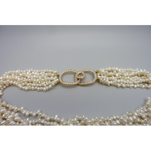 7179 - A multi-strand fresh water pearl necklace, 88g