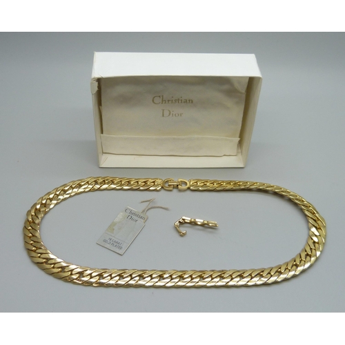 7191 - A Christian Dior curb chain necklace with pouch and original tag