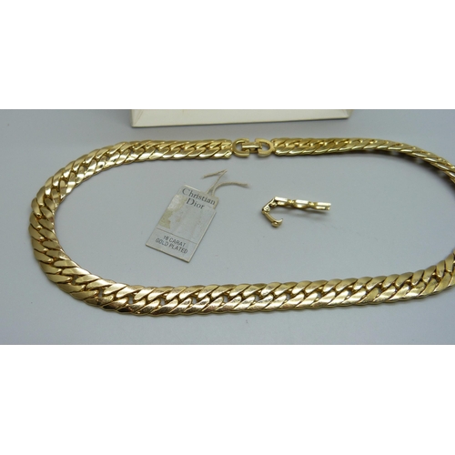 7191 - A Christian Dior curb chain necklace with pouch and original tag