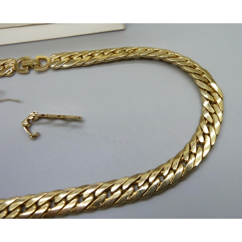 7191 - A Christian Dior curb chain necklace with pouch and original tag