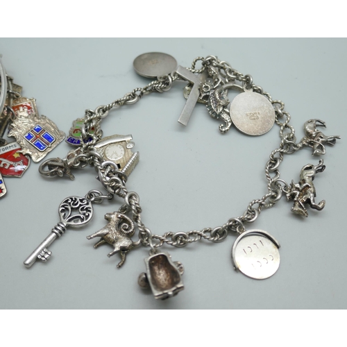 7198 - A silver charm bracelet, 37g, and a bangle with silver charms