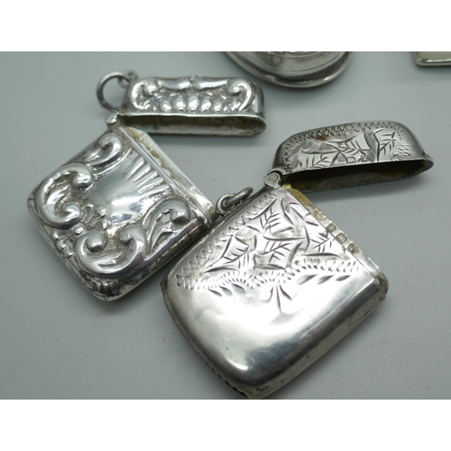 7209 - Two silver pill boxes and two silver vesta cases, 58g