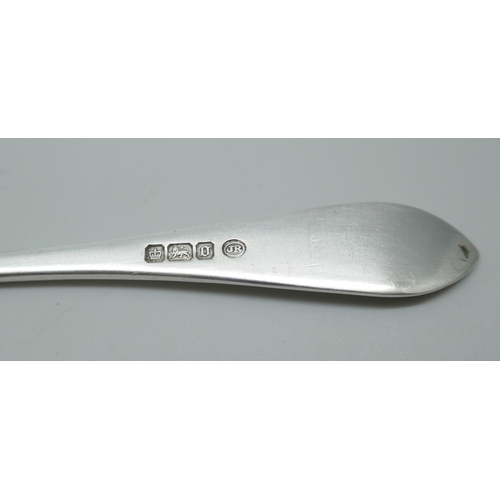 7223 - A silver fork, spoons etc., 49g