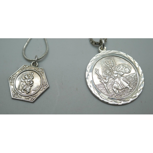 7225 - Four silver St. Christopher pendants and chains including a Georg Jensen example, 49g