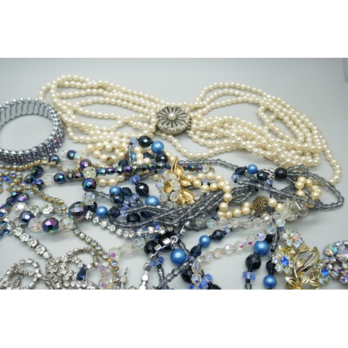 7228 - A collection of bead necklaces, paste jewellery, etc.