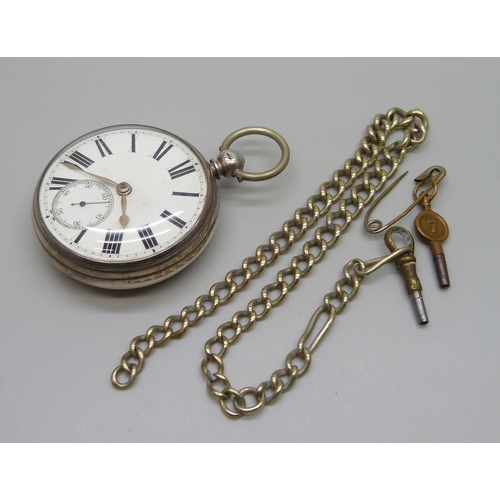 7261 - A silver cased pocket watch, Chas. Heselwood of York pocket watch, London 1874, a chain and two keys