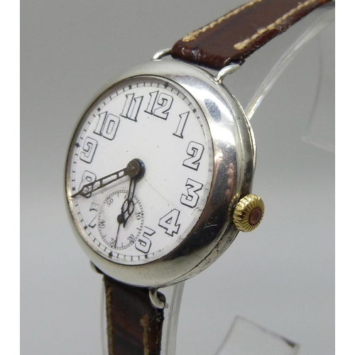 7265 - A silver cased trench wristwatch, import mark London 1916, 32mm case with new strap