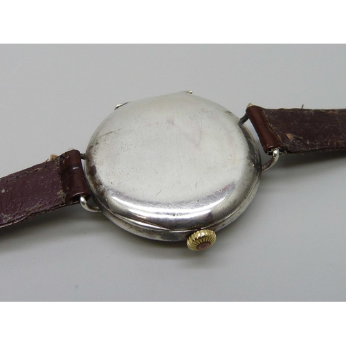 7265 - A silver cased trench wristwatch, import mark London 1916, 32mm case with new strap