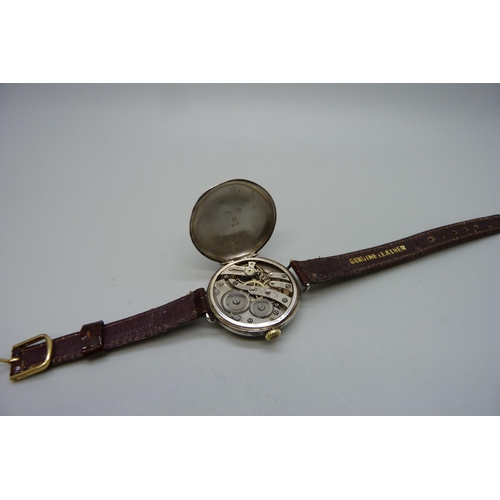 7265 - A silver cased trench wristwatch, import mark London 1916, 32mm case with new strap