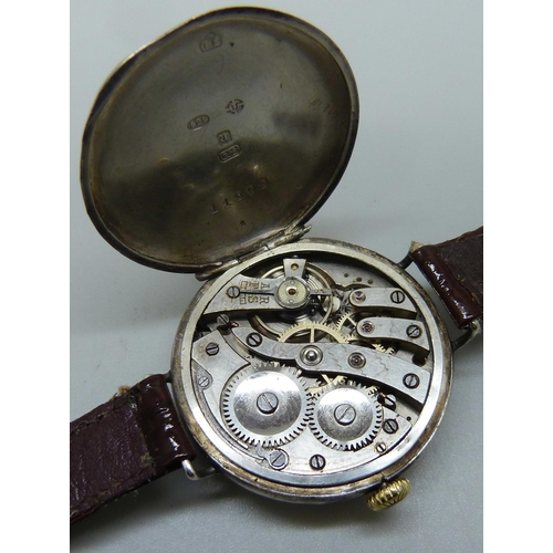 7265 - A silver cased trench wristwatch, import mark London 1916, 32mm case with new strap