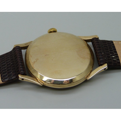 7276 - A 9ct gold Rolex wristwatch, 1950s, 30mm case, (with details of full service July 2023 at a cost of ... 