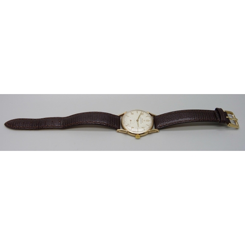 7276 - A 9ct gold Rolex wristwatch, 1950s, 30mm case, (with details of full service July 2023 at a cost of ... 