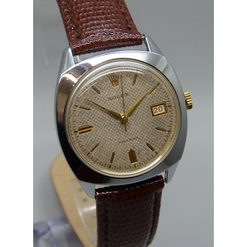 7277 - A 1950s Rolex Precision wristwatch in a replacement none Rolex case, dial/movement 27mm, on a new le... 