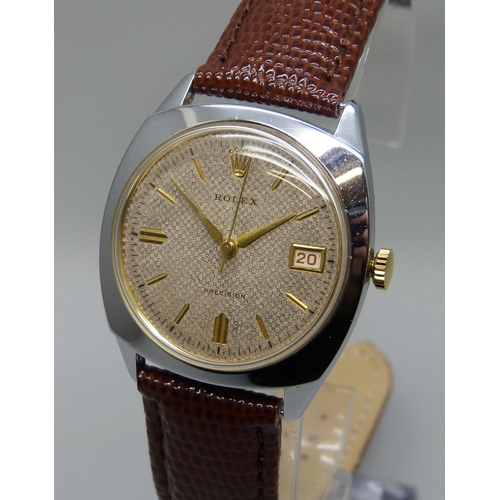 7277 - A 1950s Rolex Precision wristwatch in a replacement none Rolex case, dial/movement 27mm, on a new le... 