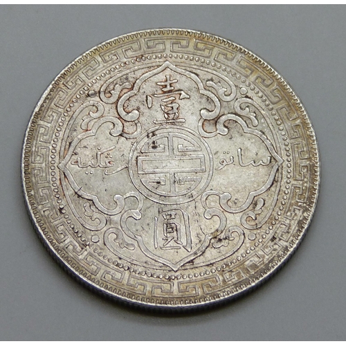 7288 - Coins; a silver British trade one dollar, 1911, Bombay Mint