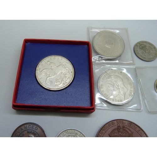 7290 - An Edward VII and Queen Alexandra medallion, two 1935 crowns, a George VI half-crown and two shillin... 