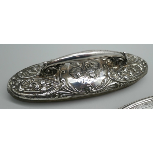 7320 - Two silver mounted nail buffers including one with Reynolds Angels detail, Birmingham 1901 and Birmi... 