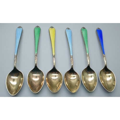 7322 - A cased set of six silver gilt and enamel spoons, by Adie Bros., in a Walker & Hall box, enamel on f... 