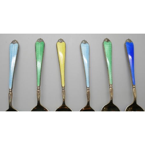 7322 - A cased set of six silver gilt and enamel spoons, by Adie Bros., in a Walker & Hall box, enamel on f... 