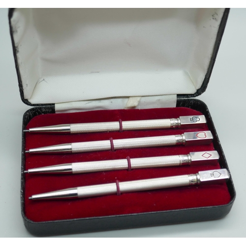 7324 - A cased set of silver bridge pencils