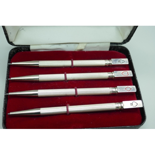 7324 - A cased set of silver bridge pencils