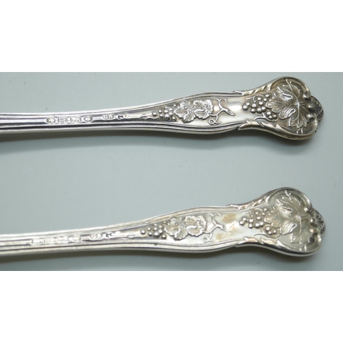 7338 - A Victorian silver vine pattern christening set, spoon and fork by George Adams, London 1867, knife ... 