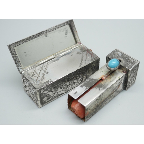 7345 - An engraved silver lipstick holder set with turquoise