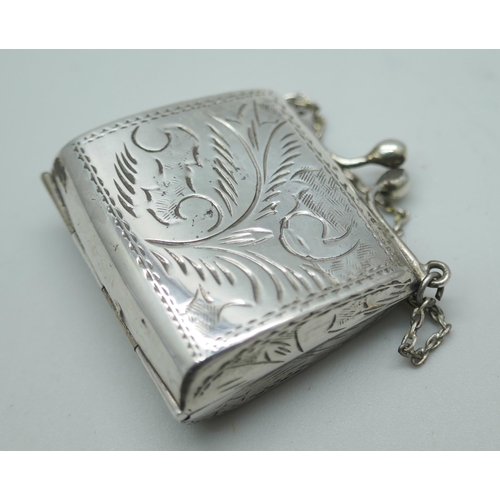 7346 - An engraved novelty silver pill box in the form of a handbag